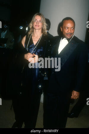 Quincy Jones and Nastassja Kinski attend the premiere of "Schindler's