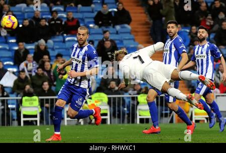 Madrid, Spain. 3rd Feb, 2019. Real Madrid's Mariano Diaz Mejia (2nd L) scores a header during a Spanish La Liga match between Real Madrid and Alaves in Madrid, Spain, on Feb. 3, 2019. Real Madrid won 3-0. Credit: Edward F. Peters/Xinhua/Alamy Live News Stock Photo