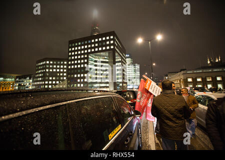London, UK. 4th Feb, 2019. Private Hire drivers protest the Congestion Charge by blocking London Bridge. Credit: George Cracknell Wright/Alamy Live News Stock Photo