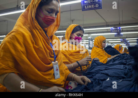 Female workers in a sewing section of a ready-made garment factory in ...