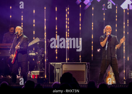 Brighton, UK. 4th Feb, 2019. Roland Orzabal (left) and Curt Smith of Tears for Fears performing at the Brighton centre. Credit: Jason Richardson/Alamy Live News Stock Photo
