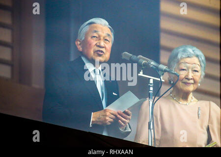 Japan's Emperor Akihito, left, accompanied by Empress Michiko delivers a speech to well-wishers who gathered to celebrate his 85th birthday at the Imperial Palace in Tokyo, Japan on December 23, 2018. Credit: Pasya/AFLO/Alamy Live News Stock Photo