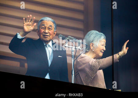 Japan's Emperor Akihito, left, accompanied by Empress Michiko waves to well-wishers who gathered to celebrate his 85th birthday at the Imperial Palace in Tokyo, Japan on December 23, 2018. Credit: Pasya/AFLO/Alamy Live News Stock Photo