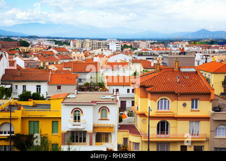 Modern red roofs of medieval french town Perpignan Stock Photo