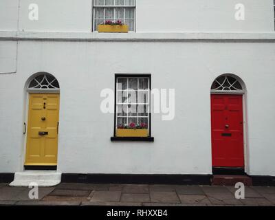 Color image of two doors on a building facade. Stock Photo