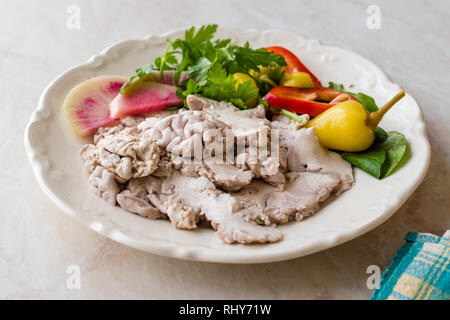 Turkish Offal Food Lamb Brain with Salad / Beyin Sogus served with Plate. Traditional Organic Food. Stock Photo