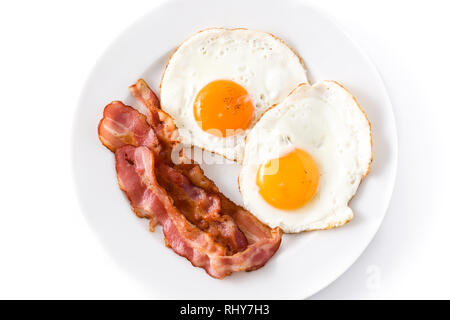 Fried eggs and bacon for breakfast isolated on white background.Top view. Stock Photo