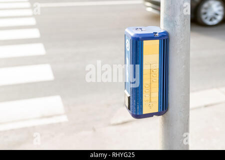 Traffic light control button with crosswalk scheme for blind people. Pedestrian road crossing for vision disabled people . Care, support and Stock Photo