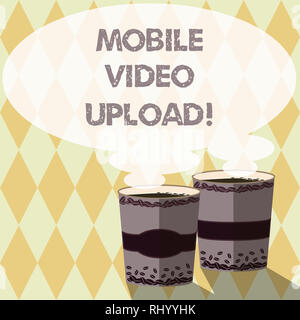 Word writing text Mobile Video Upload. Business concept for add videos on website or blog using cell phone Two To Go Cup with Beverage and Steam icon  Stock Photo