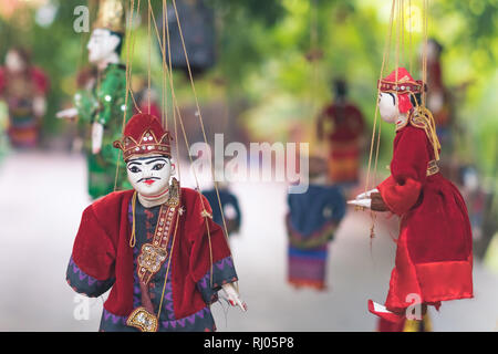 Traditional handicraft puppets for sale  in the ancient pagoda in Bagan, Myanmar Stock Photo