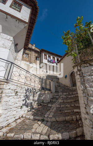 Berat, Albania - Old town, historic city .Tiny stone streets with white stone houses built in ottoman style. also called city of a thousand windows. Stock Photo