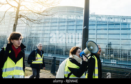 STRASBOURG, FRANCE - FEB 02, 2018: Rear view of adult woman with Louis  Vuitton backpack during protest of Gilets Jaunes Yellow Vest manifestation  anti-government demonstrations on Boulevard de Dresde Stock Photo - Alamy