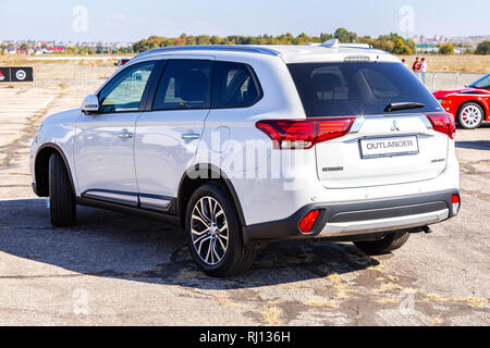 Samara, Russia - September 23, 2018: Off-road car Mitsubishi Outlander parked on the field for test driving Stock Photo