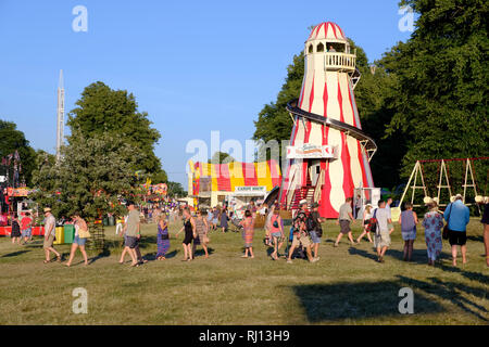 Traditional wooden helter skelter, fairground amusement ride at Cornbury Music Festival, UK Stock Photo