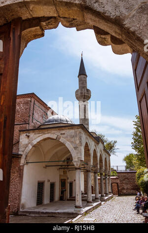 Istanbul, Turkey : Entrance of the Little Hagia Sophia mosque formerly the Byzantine Church of the Saints Sergius and Bacchus. Incidental people in ba Stock Photo