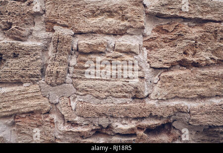 Old stone brick wall texture or background. Stock Photo