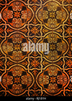 Spanish tile with beautiful figured pattern, brown, orange and black colors Stock Photo