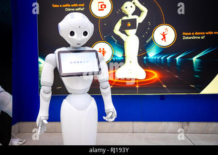 Prague, Czech republic - 01.02.2019: The Robot consultant with digital tablet in Prague airport in Czech republic. The robot is making multi-lingual a Stock Photo