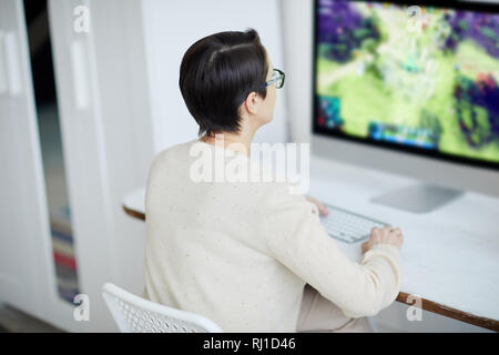 Woman Working in White Office Stock Photo