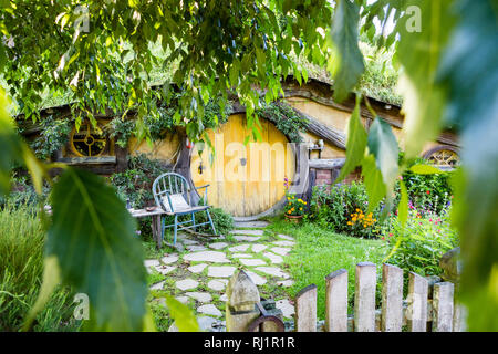 MataMata, New Zealand -  March 2017 Hobbit house with beautiful green garden in summertime Hobbiton Stock Photo