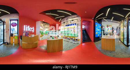 360 degree panoramic view of MINSK, BELARUS - AUGUST, 2017: Full spherical 360 angle degrees seamless panorama in interior modern store salon of mobile operator with device in equ