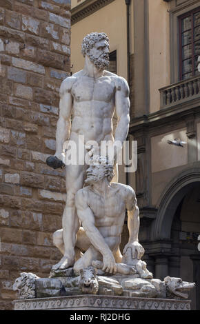 Hercules and Cacus marble statue to the right of the entrance of the Palazzo Vecchio in the Piazza della Signoria, Florence, Italy.