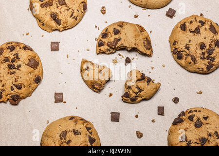 Homemade Chocolate Chip Cookies on a light kitchen table. Top view flat lay background. Stock Photo