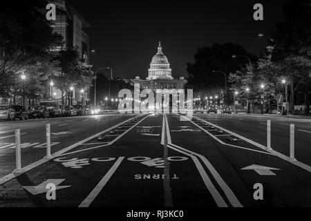 Bike lanes on Pennsylvania Avenue and the United States Capitol at night, in Washington, DC. Stock Photo