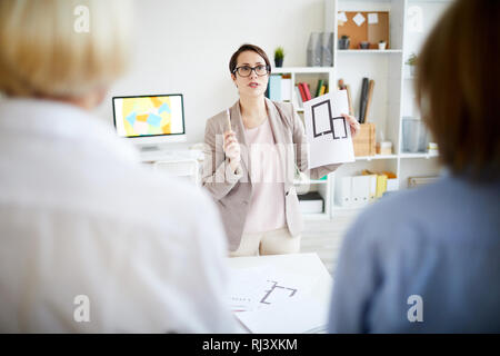 Colleagues Discussing design Stock Photo
