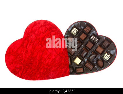 Heart shaped box with chocolate candies isolated on white background. A popular gift for Valentine's Day. Stock Photo