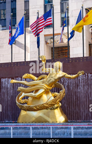 New York - October 17 2016: The Prometheus sculpture above the Lower Plaza by the skating rink at Rockefeller Center, a Historic Landmark in Manhattan Stock Photo
