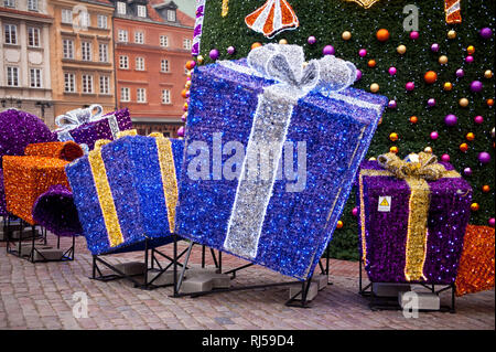 Xmas tree and gifts decorations in Warsaw, Old Town, winter seasonal Christmas attractions in Poland, December 2013, Stock Photo