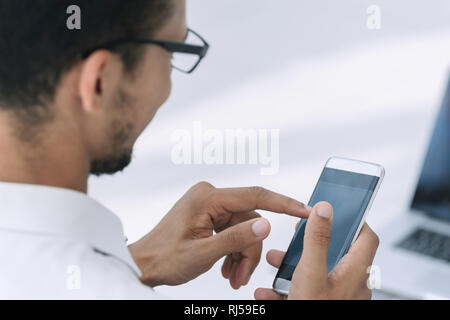 close up. business men using a modern smartphone Stock Photo