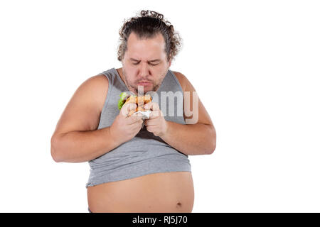 Portrait of funny fat man eating fast food burger isolated Stock Photo