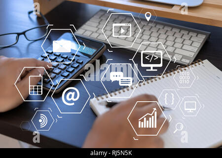 Man using  tablet computer  virtual interface graphic icons network diagram Digital marketing Stock Photo