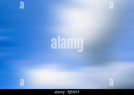 Nimbus clouds or monsoon clouds or rain clouds in the blue sky shot with motion blur effect. Stock Photo