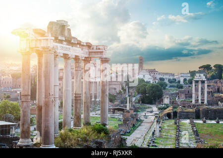 Roman ruins in Rome, Forum against cloudy sky. Rome, Italy