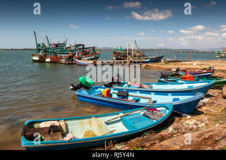 Cambodia, Preah Koh Kong, Prek Kaoh Pao river colourful fishing boats on messy shore Stock Photo