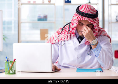 Arab doctor working in the clinic Stock Photo