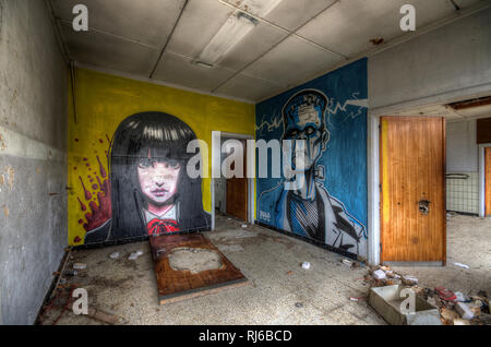 Abandoned school with graffiti made by Pete One. Belgium. Stock Photo