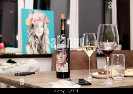 Russia Kemerovo 2019-01-19 Matsu El Picaro red Spanish wine from Toro stands on a wooden table against the window, beautiful pictures, glasses, snacks Stock Photo