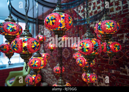 Amazing traditional handmade turkish lamps in souvenir shop. Mosaic of colored glass. for sale on Grand Bazaar (kapali carsi) at Istanbul, Turkey Stock Photo
