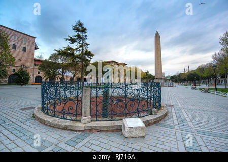 The greek Serpent Column and Ancient Egyptian Obelisk of Theodosius on the site of the ancient Roman Hippodrome of Constantinople in Istanbul, Turkey Stock Photo