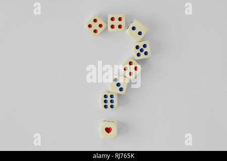 Question mark made of dices and heart - Concept of risk and chance on love Stock Photo
