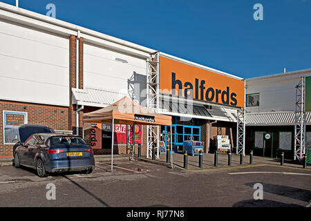 A Halfords store in Otford, Kent, selling autocare and cycling supplies Stock Photo