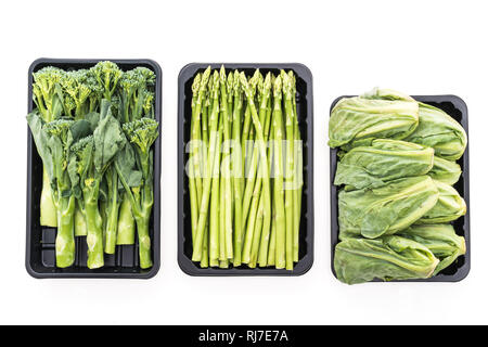 Fresh green Asparagus vegetable , Baby Broccoli vegetable , Brussel sprouts vegetable isolated on white background - Healthy food style concept Stock Photo