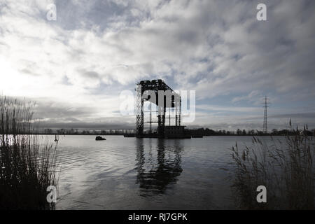 Karnin Lift Bridge. Destroyed Historic Railway Bridge on Usedom Island near Karnin at Peenestrom River, Mecklenburg-Vorpommern, Germany Stock Photo