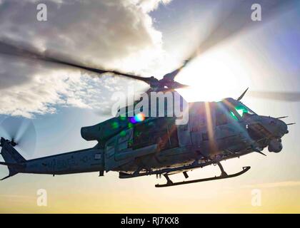 190130-N-HG389-0044 MEDITERRANEAN SEA (Jan. 30, 2019) An UH-1Y Huey helicopter assigned to the “Black Knights” of Marine Medium Tiltrotor Squadron (VMM) 264 (Reinforced) departs the flight deck of the San Antonio-class amphibious transport dock ship USS Arlington (LPD 24), Jan. 30, 2019. Arlington is on a scheduled deployment as part of the Kearsarge Amphibious Ready Group in support of maritime security operations, crisis response and theater security cooperation, while also providing a forward naval presence. (U.S. Navy photo by Mass Communication Specialist 2nd Class Brandon Parker/Released Stock Photo