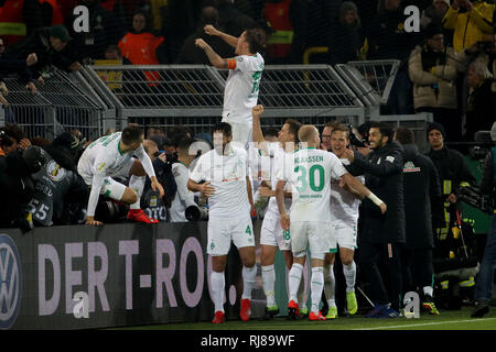 Dortmund, Germany. 5th Feb, 2019. Players of Bremen celebrate after winning the DFB Cup third round match between Borussia Dortmund and SV Werder Bremen in Dortmund, Germany, on Feb. 5, 2019. Credit: Joachim Bywaletz/Xinhua/Alamy Live News Stock Photo