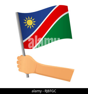 Namibia flag in hand. Patriotic background. National flag of Namibia  illustration Stock Photo